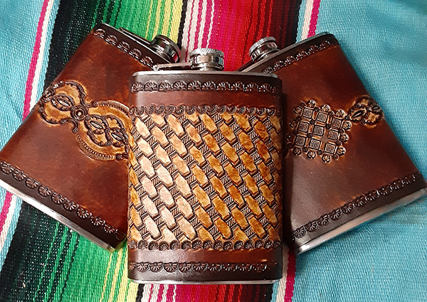 3 leather flasks