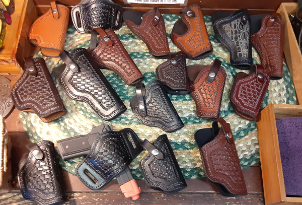 a group of gun holsters